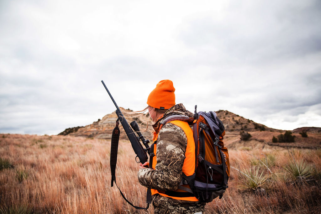 Hunter glassing broken desert country in the Big Bend, hours from the nearest cooler
